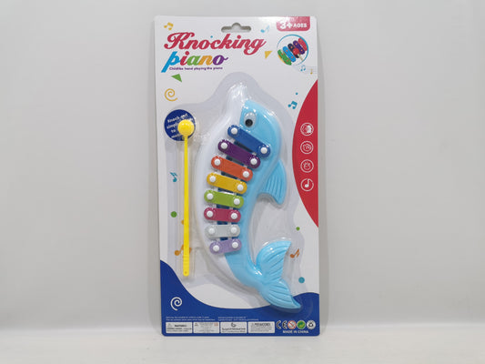 Dolphin playing the piano